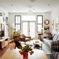 Bright living room with a door to the balcony