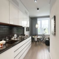 Black apron in a linear kitchen