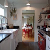 White sink in a black countertop