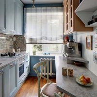 Narrow dining table along the kitchen wall