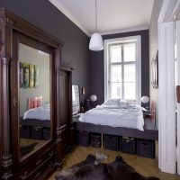 Wooden cabinet with a large mirror