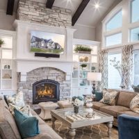 Two comfortable sofas in front of the living room fireplace