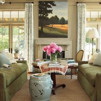 Pink peonies in a vase on a coffee table