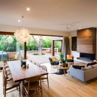 Dining table in the room with panoramic glazing