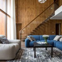 Blue sofa in the lobby of a country house