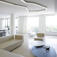 Black wall in a spacious living room