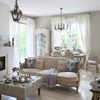 Living room of a private house with a fireplace in the interior