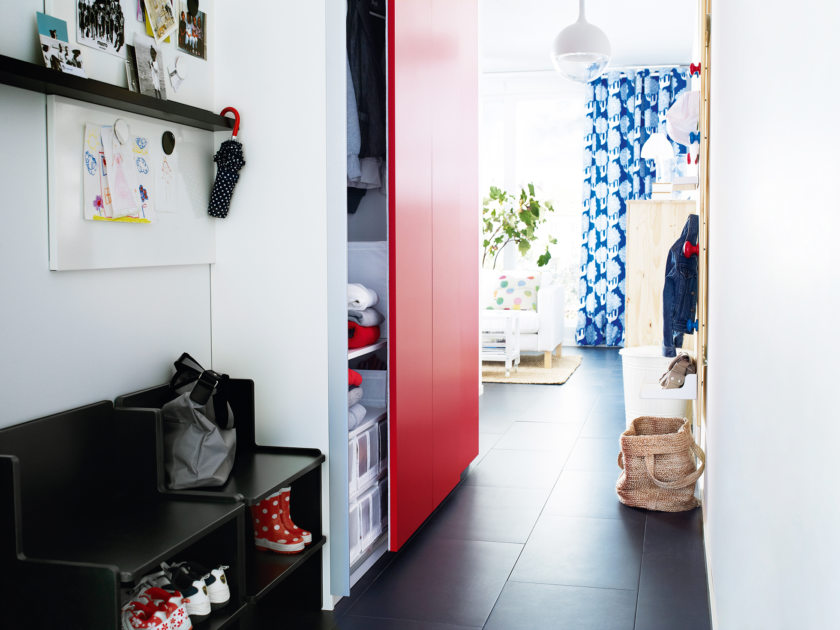 Red sliding door on the closet in the hallway