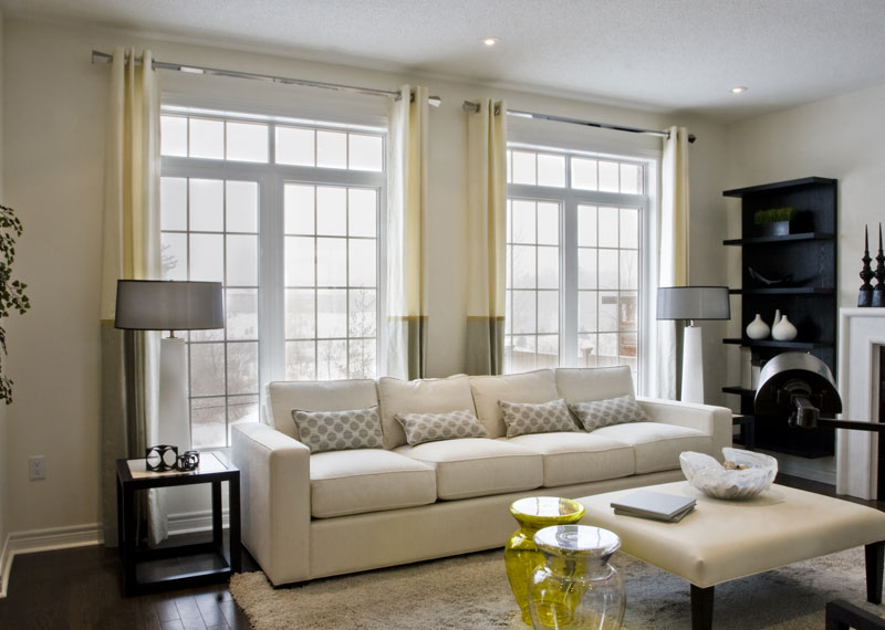 Combined curtains on the windows of a modern living room