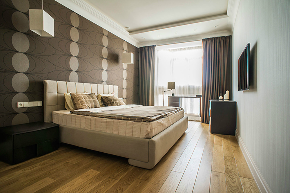 Wooden floor in the bedroom with dark brown wallpaper