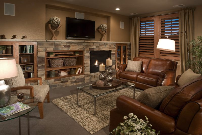 The interior of the living room of a private house in dark colors