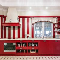 Linear layout of the kitchen with a sink in front of the window