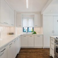 Blind facades of a white kitchen unit