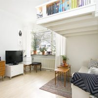 White sofa under the bed on the ceiling