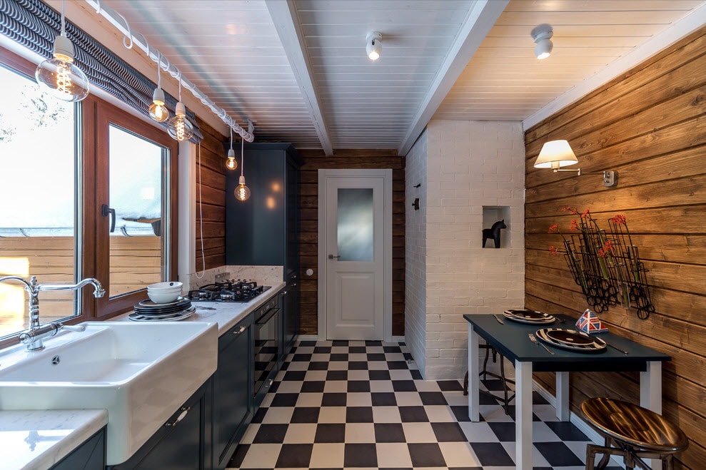 Small kitchen with sink in front of the window