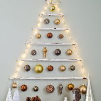 Christmas tree made of paper tubes and Christmas toys