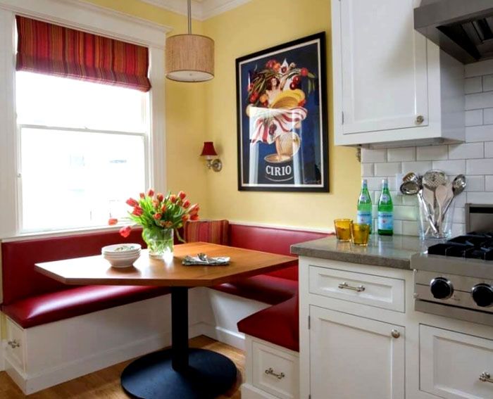 The design of the dining area in a narrow kitchen