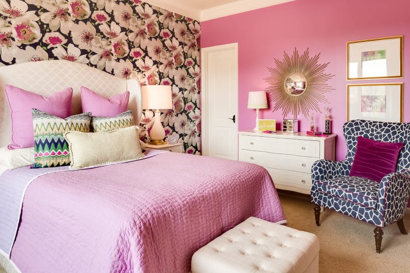 Wallpaper with large flowers in the design of a bedroom for a girl