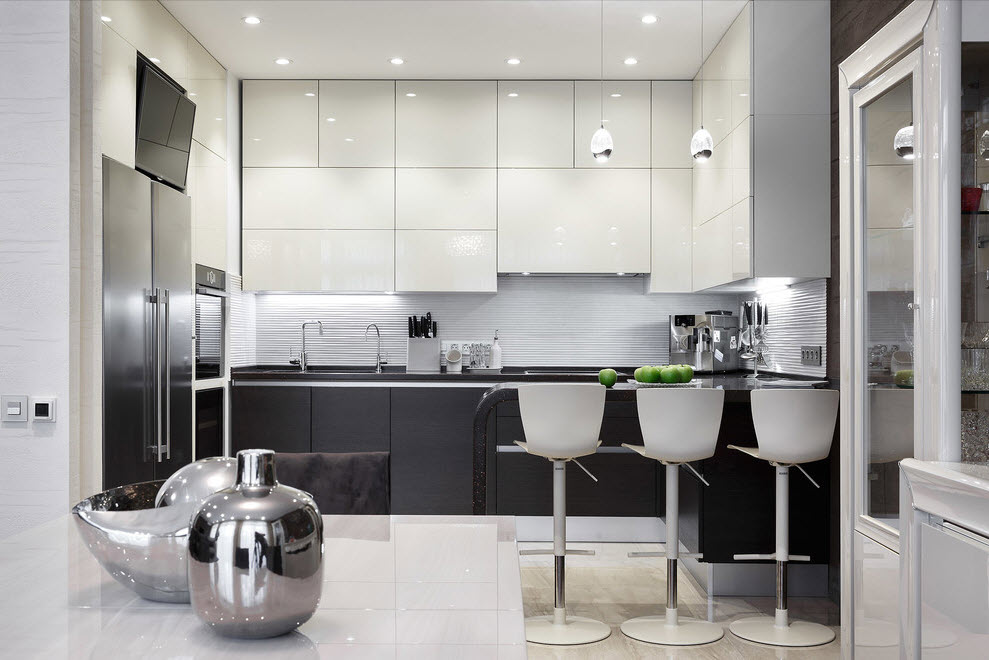 Bright lighting in a black and white kitchen