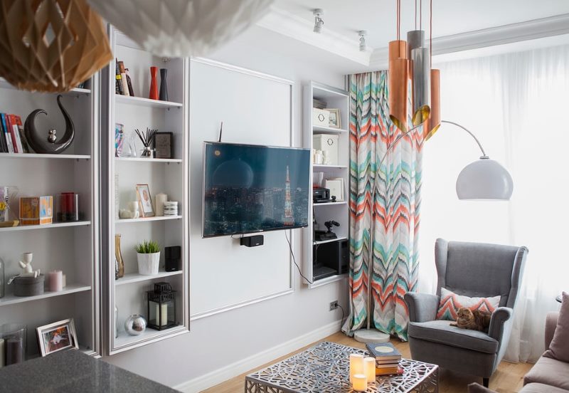 Colorful curtains in the interior of the hall with gray walls