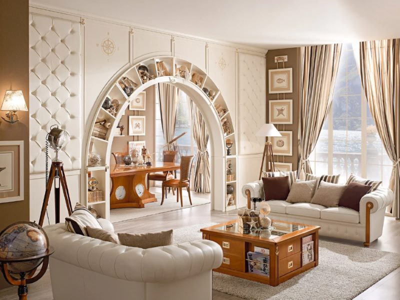 Bookshelves in an arch between adjacent rooms