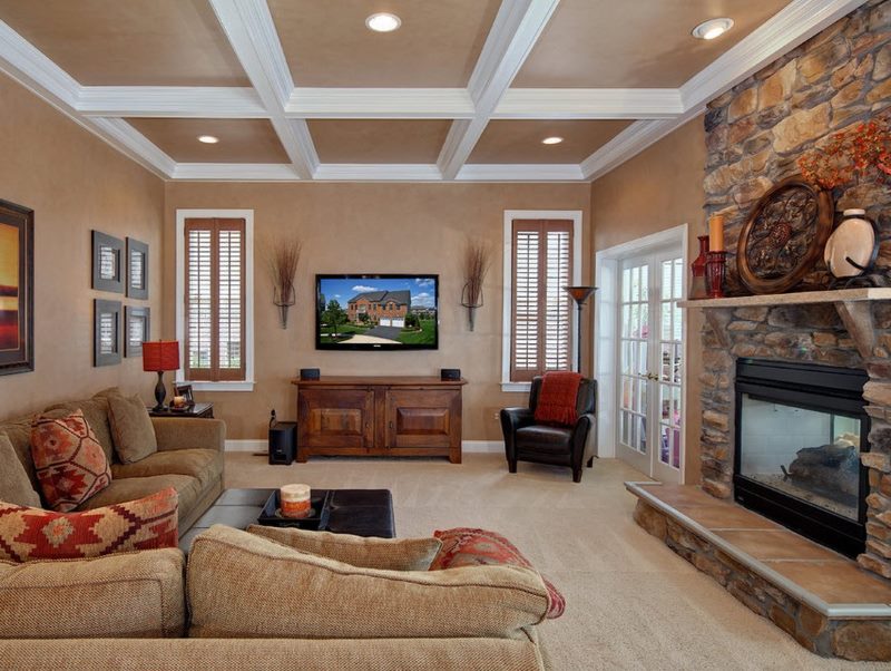 Wooden shutters on narrow windows in the hall of a private house