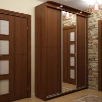 Cabinet finish in the hallway matching the doors