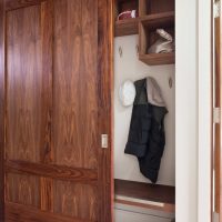 Wooden cabinet doors on a tubular rail