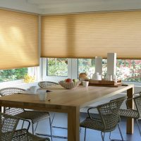 Light brown curtains on the kitchen windows