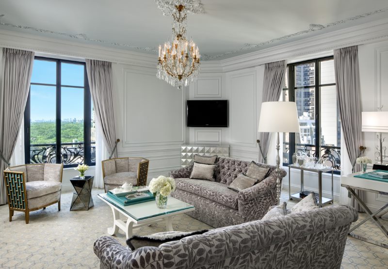 Sofa set with gray upholstery in the corner living room