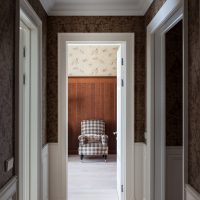 Light floor in the corridor with dark walls