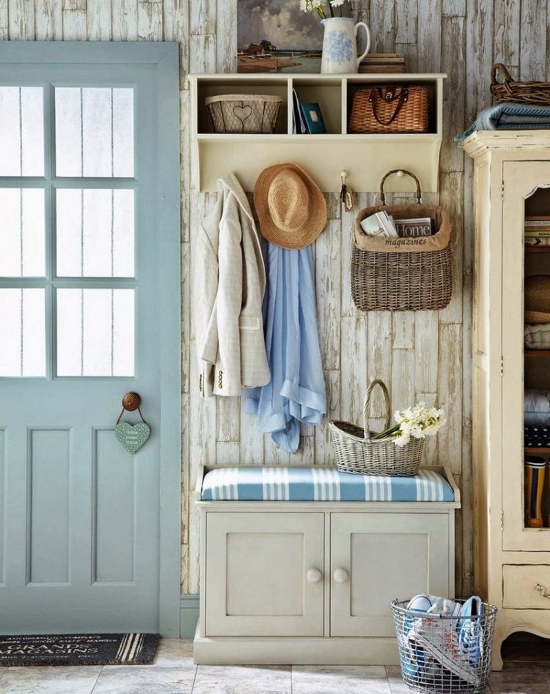 Open hanger with shelves in the hallway of a private house