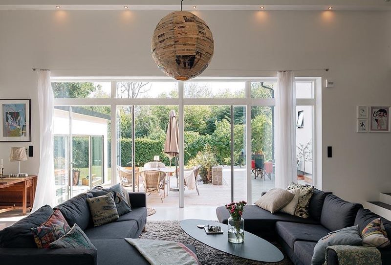 Panoramic window in the interior of the living room of a country house