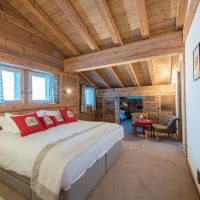 Wooden ceiling in the bedroom of a private house