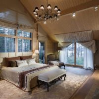 Chandelier in the interior of the bedroom of the spouses