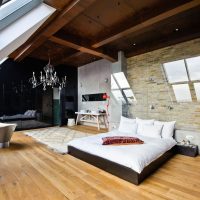 Stainless steel bathtub in the bedroom of a young man