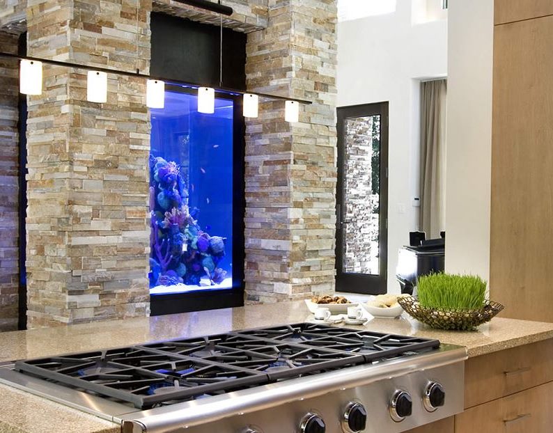 Built-in aquarium in the interior of a modern kitchen