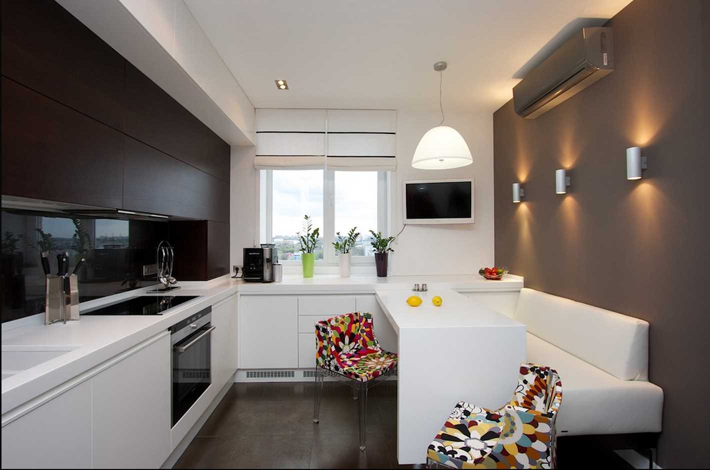 Kitchen interior 14 sq m with sofa