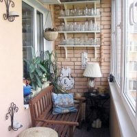 Wooden bench for relaxing on the balcony