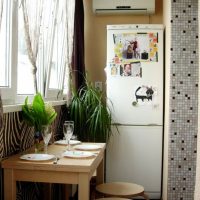 Two-compartment refrigerator on the balcony of the apartment