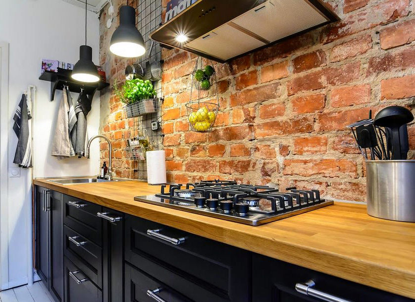 Brick apron in the kitchen in the loft style