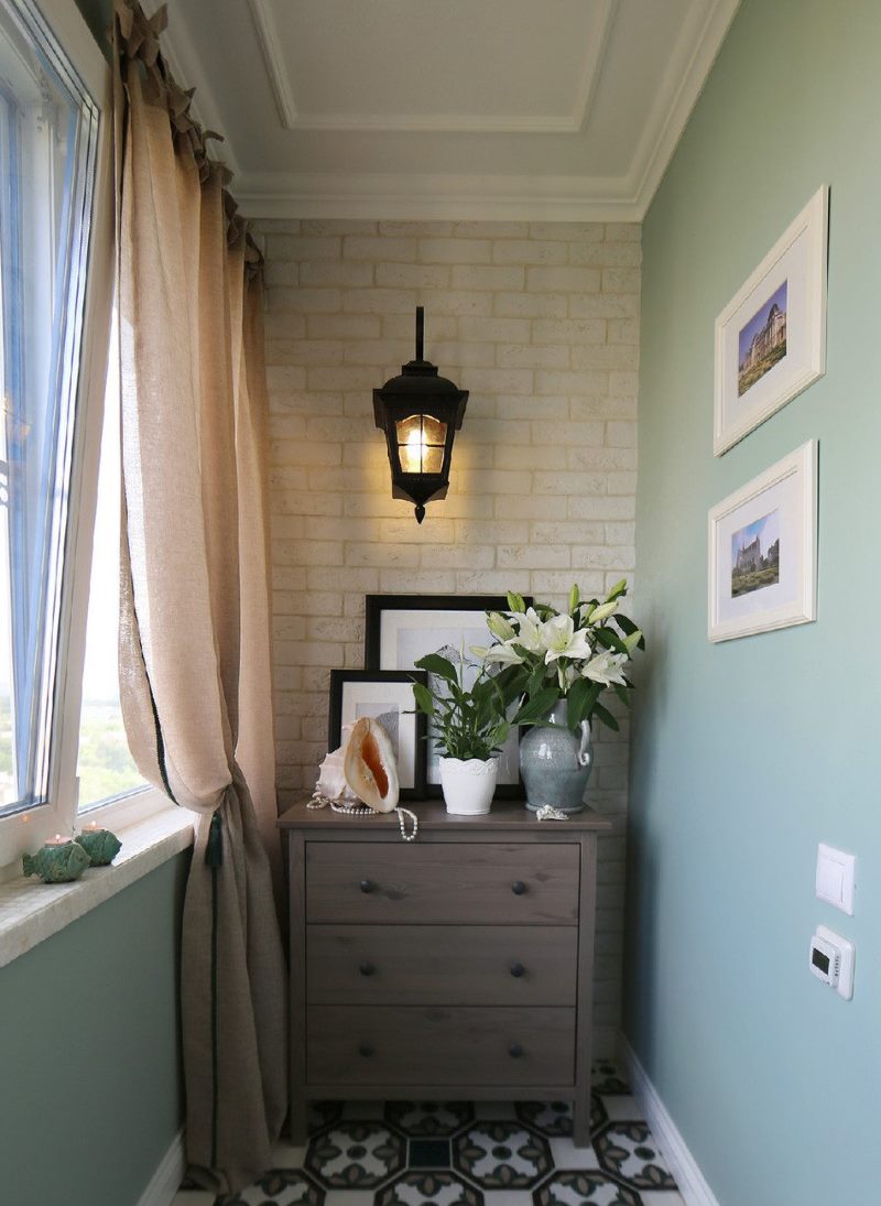 Beige curtains on a comfortable balcony