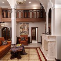 Marble-faced fireplace in a large living room