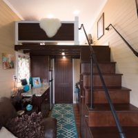 Staircase to the bedroom of a narrow summer house