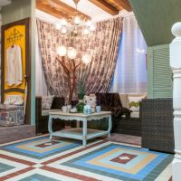 Ceramic floor in the kitchen-living room of a rural house