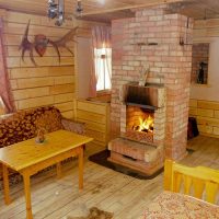 A fireplace stove in the center of a country house