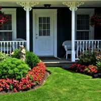 Porch of a private house with a white door