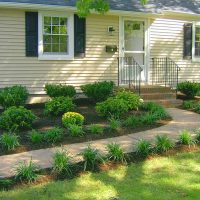 Small porch with metal railing