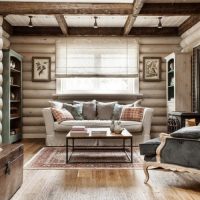 Design of a living room in a house made of logs