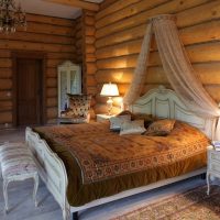 Classic furniture in the log cabin bedroom